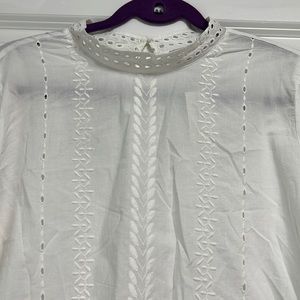 White eyelet top